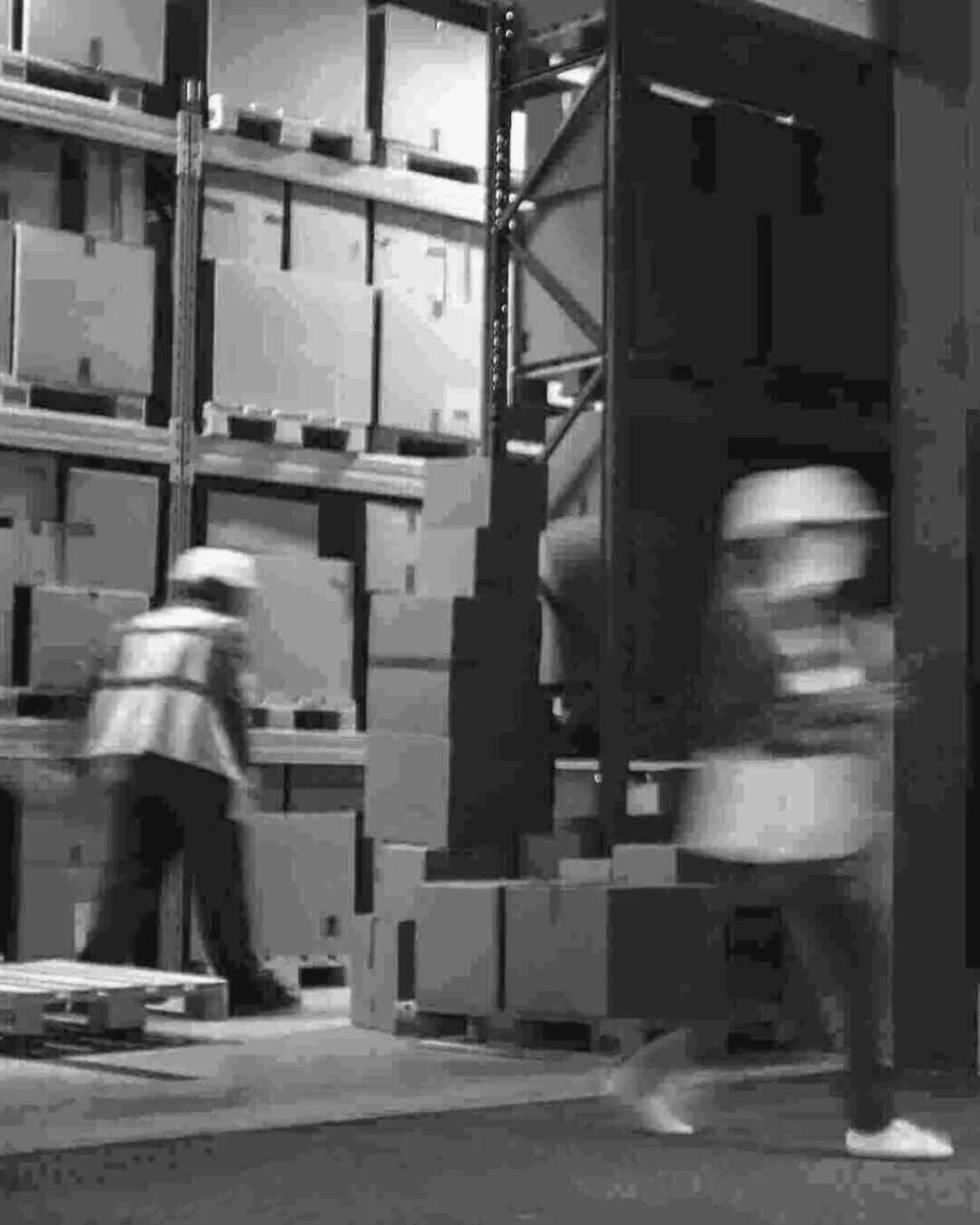 Thomax team members loading freight at a dock